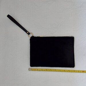 A New Day faux pony hair clutch with gold accents and inside pockets